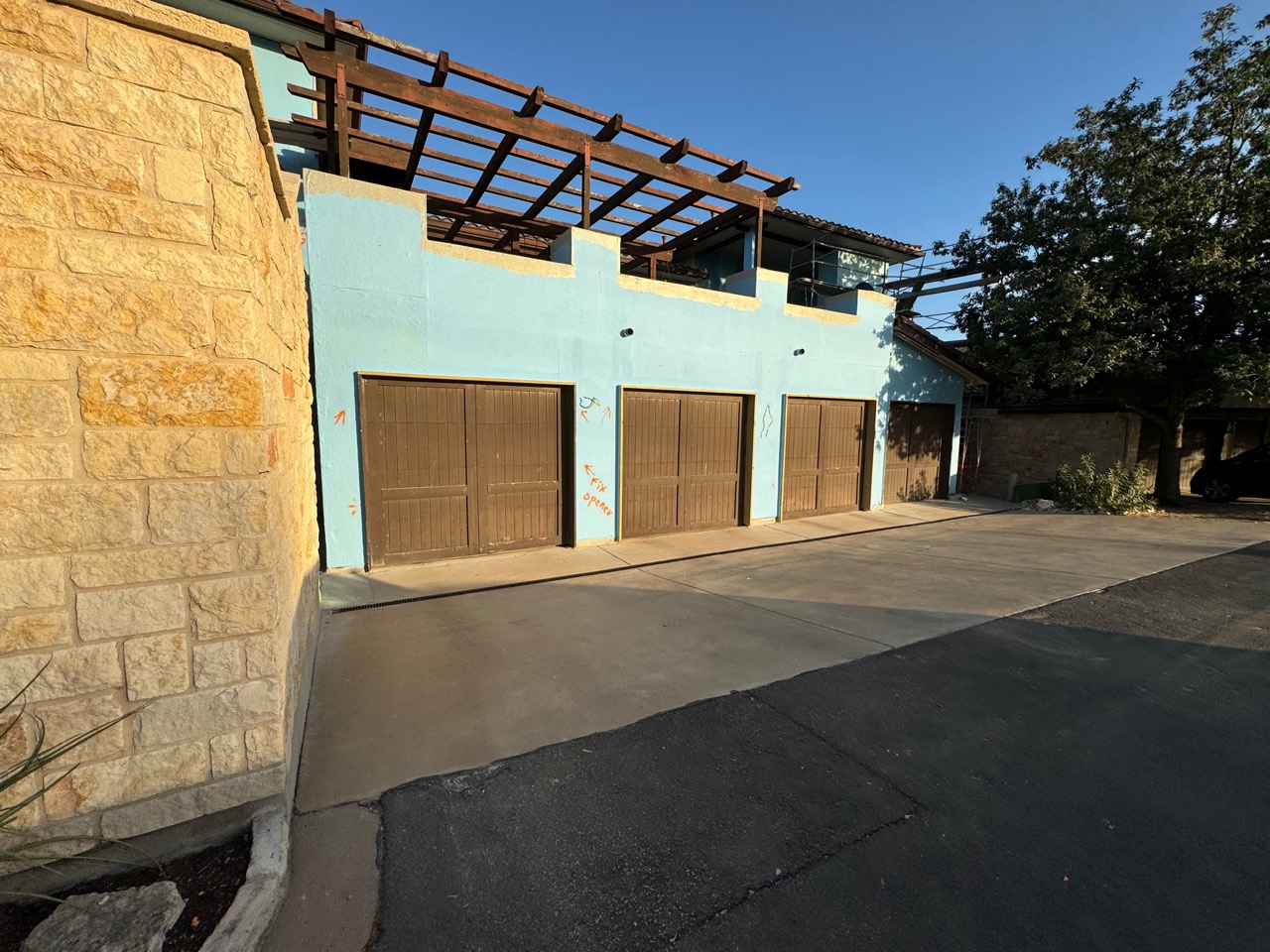 Exterior wall coated with waterproofing before finish installation
