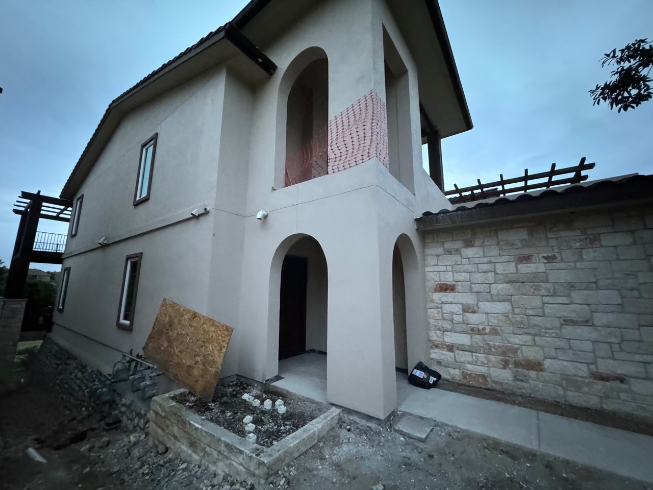 Residence after exterior waterproofing and window repair work